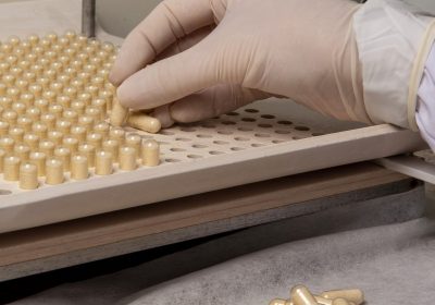 pharmacy professional using encapsulating plate production homeopathic allopathic remedies 2